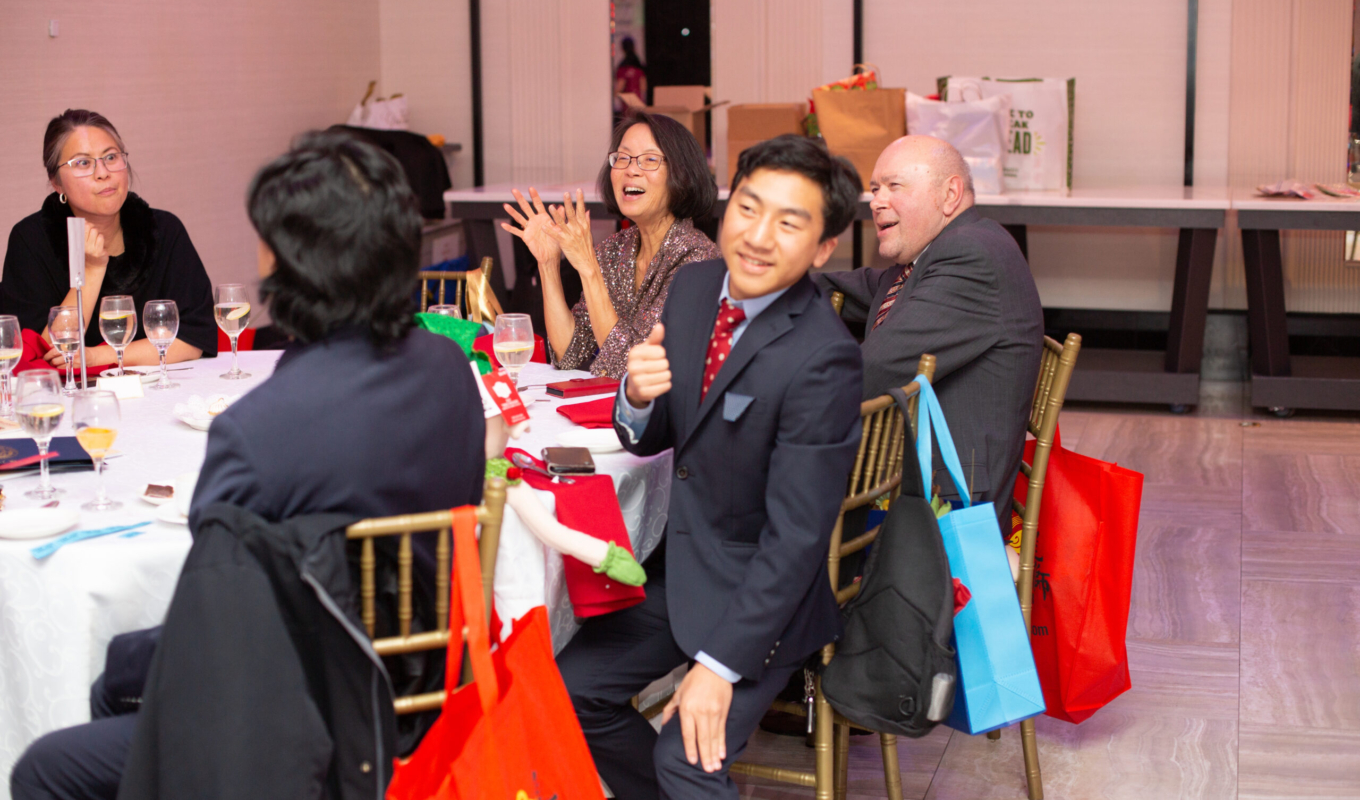 Barbara’s son’s table cheering 2024 HB