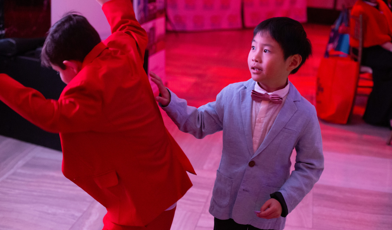 Caleb & Samuel playing on dance floor 2024 HB