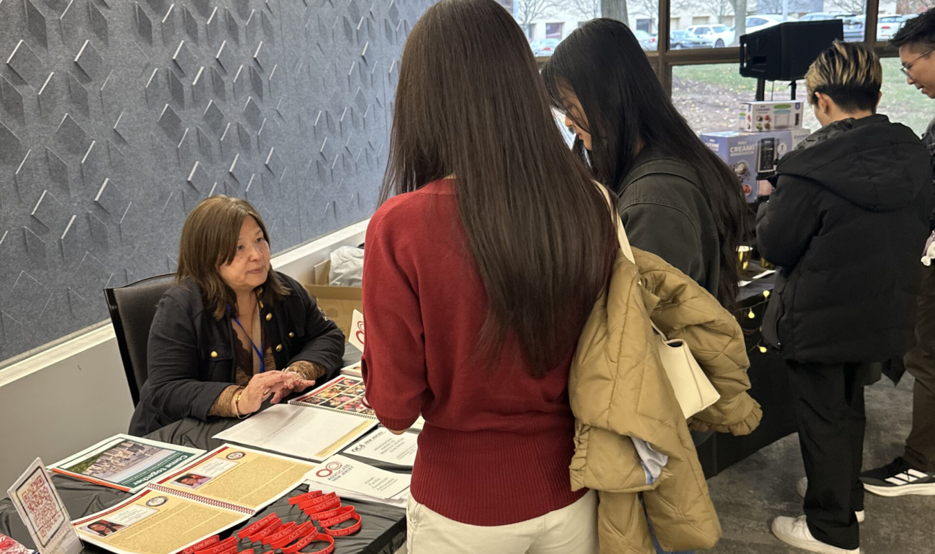 Jenny at OCA-NJ Booth talking to attendees 2 – 2025 Temple St