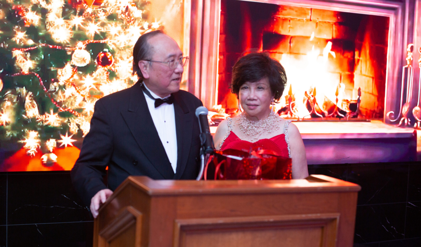 Peter & Helen Yu at podium 2024 HB